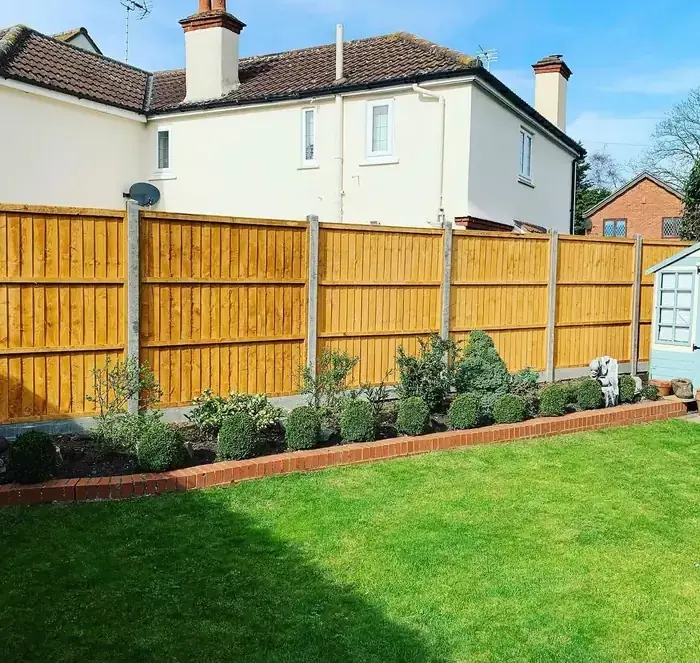 New close-board fencing and freshly laid lawn to a rear garden in Hertfordshire