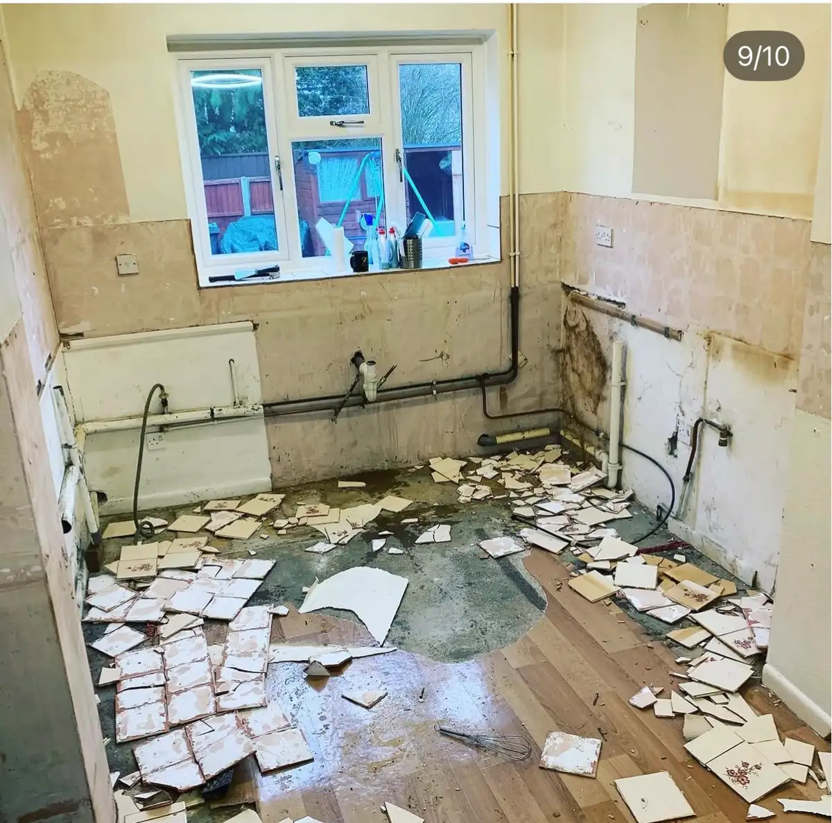 Old kitchen stripped back to bare walls before a full refit in Sawbridgeworth