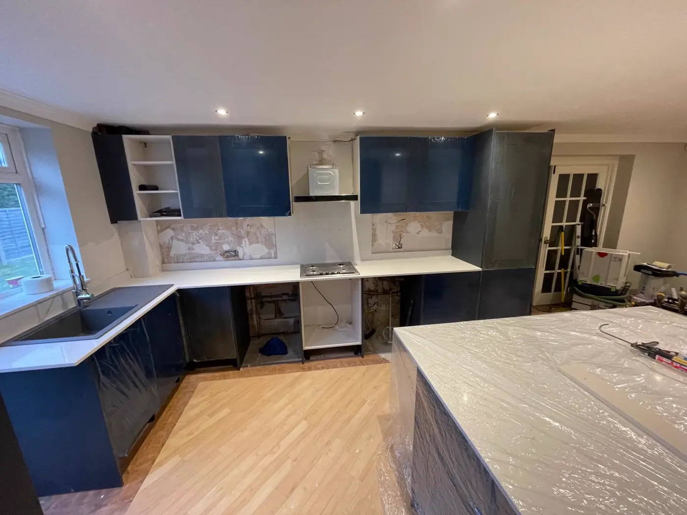 Kitchen units set level and dry-fitted during installation by RenovationPlanltd in Sawbridgeworth