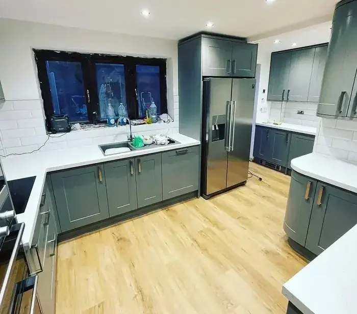 Sage green shaker kitchen with quartz worktops fitted in Harlow, Essex